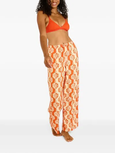 Banana Moon Okeah Sarong Tropical-print Drawstring Trousers In Orange