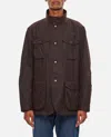 Barbour Waxed Jacket With Elbow Patches And High Neck In Brown
