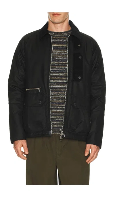 Barbour Tract Wax Jacket In Black