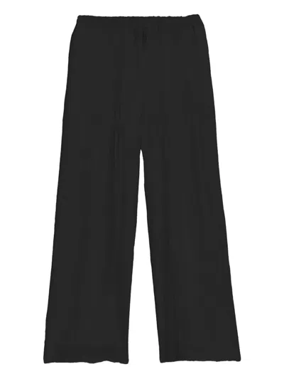 Baserange Folio Trousers In Black