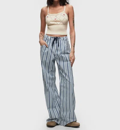 Baum Und Pferdgarten Nanny Trousers In Striped Spring Denim In Multi
