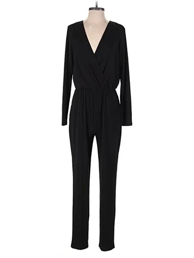 Pre-owned Bcbgeneration Jumpsuit In Black