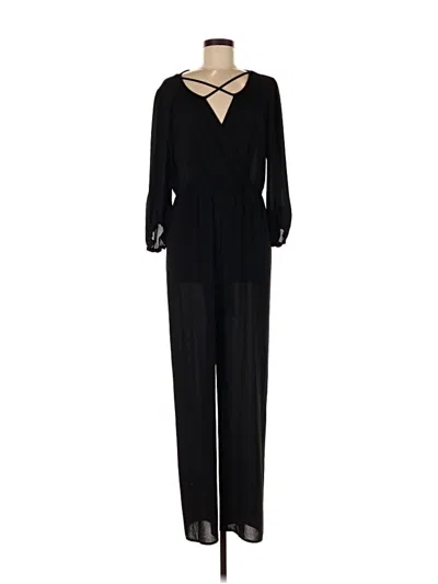 Pre-owned Bcbgeneration Jumpsuit In Black