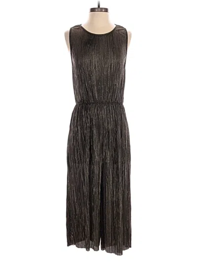 Pre-owned Bcbgeneration Jumpsuit In Gold