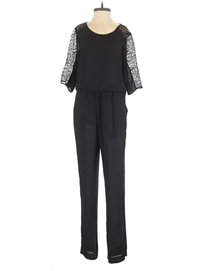 Pre-owned Bcbgmaxazria Jumpsuit In Black