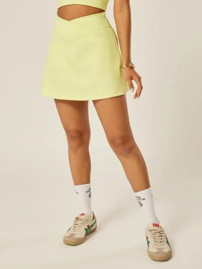 Be Athletica Stretch Wrap Waist Tennis Skort In Gold
