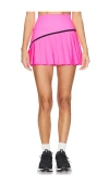 Beach Riot Pleated Active Skort In Radiant Orchid