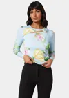 Bebe Cut Out Flower Long Sleeve Top In Clear Sky Floral Print