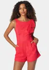 Bebe Eyelet Open Back Bow Detail Romper In Hibiscus