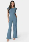Bebe Flutter Sleeve Core Jumpsuit In Denim