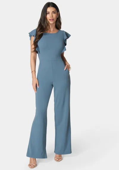 Bebe Flutter Sleeve Core Jumpsuit In Denim