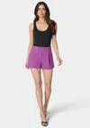 Bebe High Waist Button Detail Flared Shorts In Dahlia