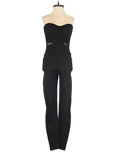 Pre-owned Bebe Jumpsuit In Black