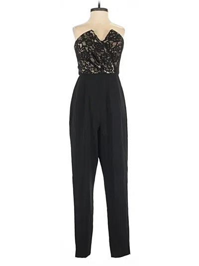 Pre-owned Bebe Jumpsuit In Black