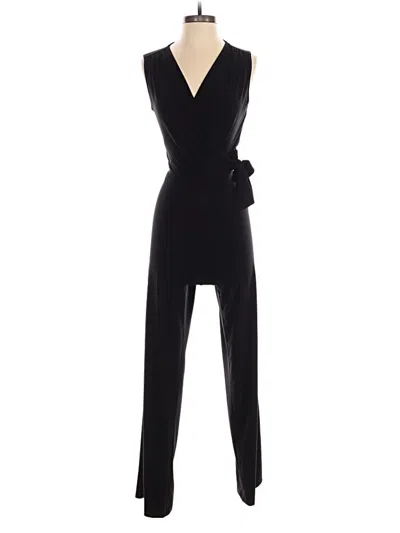 Pre-owned Bebe Jumpsuit In Black