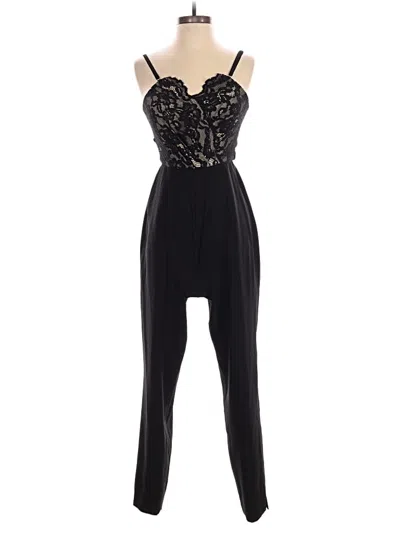 Pre-owned Bebe Jumpsuit In Black