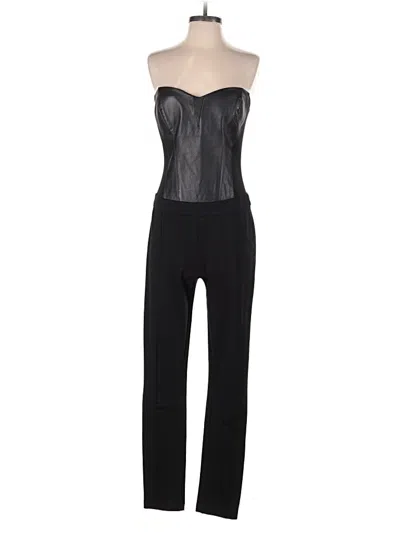 Pre-owned Bebe Jumpsuit In Black