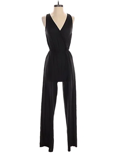 Pre-owned Bebe Jumpsuit In Black