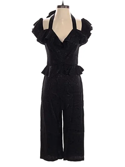 Pre-owned Bebe Jumpsuit In Black