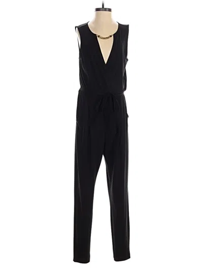 Pre-owned Bebe Jumpsuit In Black