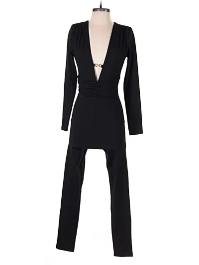 Pre-owned Bebe Jumpsuit In Black