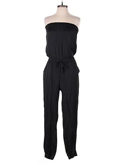 Pre-owned Bebe Jumpsuit In Black