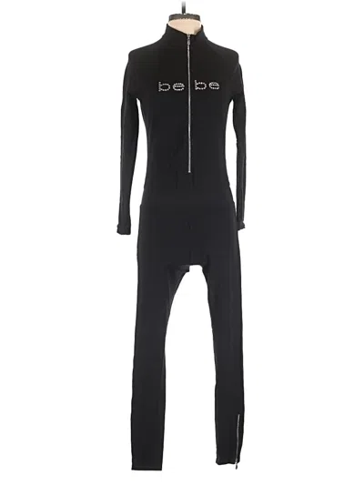 Pre-owned Bebe Jumpsuit In Black