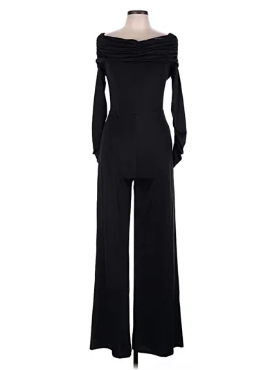 Pre-owned Bebe Jumpsuit In Black