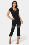 Bebe Lace Insert Bow Capri Legging In Black