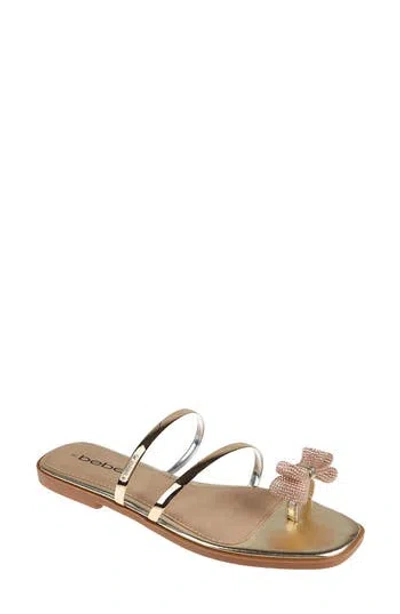 Bebe Rhinestone Bow Toe Post Sandal In Light Gold