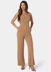 Bebe V-neck Core Jumpsuit In Neutral