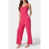 Bebe V Wire Core Jumpsuit In Pink