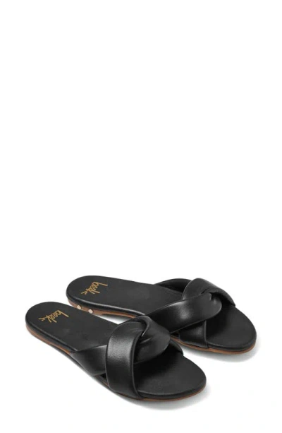 Beek Twistybird Slide Sandal In Black