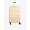 Beis Beige The Large Checkin Roller 4-wheel Expandable Suitcase In Sand