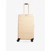 Beis Beige The Medium Check-in Roller 4-wheel Expandable Suitcase In Sand