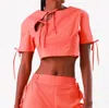 Bela Brand Cropped Bows Top In Orange In Orange