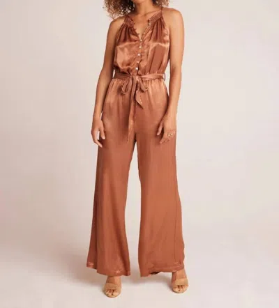 BELLA DAHL SMOCKED HALTER JUMPSUIT IN TROPICAL TWILIGHT