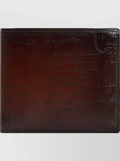 BERLUTI CALF LEATHER BI-FOLD WALLET WITH EMBOSSED WRITING