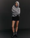 Bershka Mini Skort With Buckle In Black
