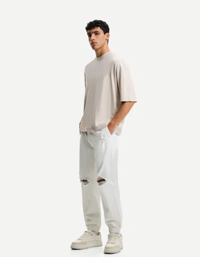 Bershka Ripped Jogger Jeans In White