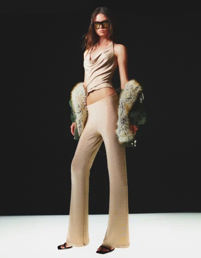 Bershka Shiny Flared Pants In Gold