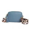 Betsy & Floss Women's Blue Verona Crossbody Tassel Denim Bag With Light Leopard Strap In Blue