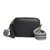 Betsy & Floss Women's Verona Crossbody Tassel Black Bag With Black & White Chevron Strap In Black