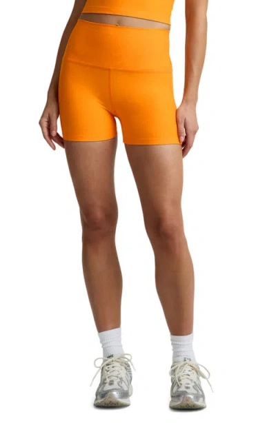 Beyond Yoga All For Run Bike Shorts In Orange