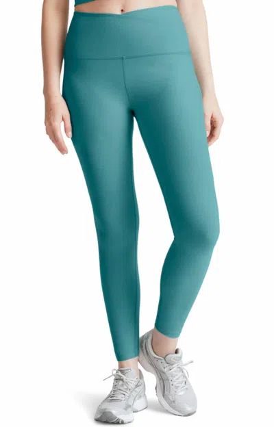 Beyond Yoga At Your Leisure High Waisted Midi Leggings In Teal In Green