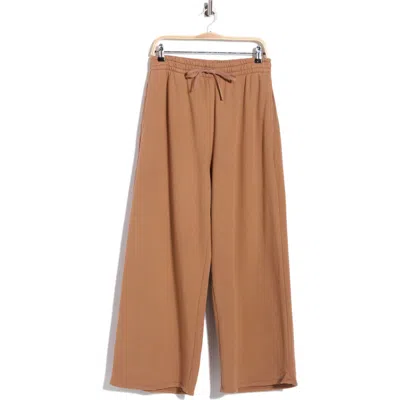 Beyond Yoga Cali Wide Leg Cropped Pants In Washed Desert Sand