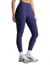 Beyond Yoga Caught In The Midi High Waisted Legging In Eternal Blue Heather In Blue