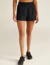 Beyond Yoga In Stride Lined Shorts In Black