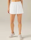Beyond Yoga In Stride Lined Shorts In White