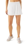 BEYOND YOGA IN STRIDE LINED SHORTS
